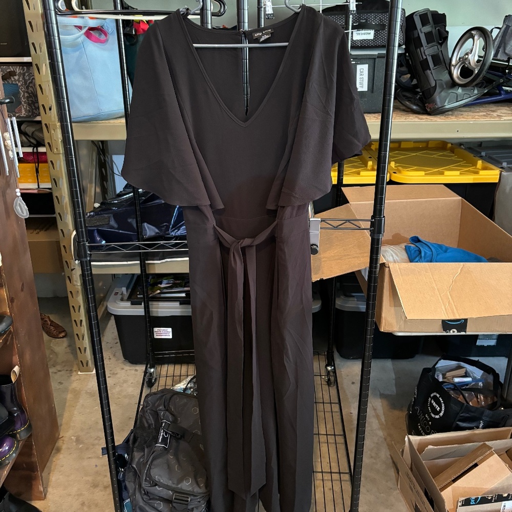 Super cute black jumpsuit! Size M